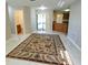 Open concept living area showcasing tile floors, neutral paint and sliding glass door at 501 Kilimanjaro Dr, Kissimmee, FL 34758