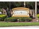 Community entrance sign for Mira Vista with manicured landscaping at 803 Shady Canyon Way, Kissimmee, FL 34759