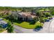 A well-maintained home with a lush green lawn and mature trees at 803 Shady Canyon Way, Kissimmee, FL 34759