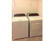 Side-by-side washer and dryer in laundry area at 8607 Crescendo Ave, Windermere, FL 34786