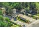 Aerial view of the Bellalago community entrance featuring lush green landscaping and attractive architecture at 1211 Terralago Way, Kissimmee, FL 34746