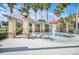 Community splash pad and lounging area with mature landscaping at 1211 Terralago Way, Kissimmee, FL 34746