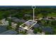 Aerial view of a home with mature landscaping and a well-manicured lawn in a neighborhood at 12649 Dallington Ter, Winter Garden, FL 34787