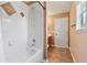 Well-lit bathroom featuring a shower and tub combination at 12649 Dallington Ter, Winter Garden, FL 34787