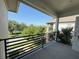 Relax on the balcony and take in serene lake views and lush greenery in this gorgeous home at 13065 Gabor Ave, Orlando, FL 32827