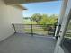 Enjoy picturesque lake and landscaping views from this private balcony at 13065 Gabor Ave, Orlando, FL 32827