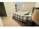 Cozy bedroom featuring a large window for natural light at 13065 Gabor Ave, Orlando, FL 32827