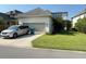 A well-manicured lawn and front yard, showcasing curb appeal and landscaping at 13065 Gabor Ave, Orlando, FL 32827