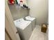 Functional laundry room equipped with a modern washer and dryer unit at 13065 Gabor Ave, Orlando, FL 32827