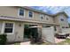 The cozy patio features an outdoor dining set, privacy fence, and sliding glass doors to the interior at 13885 Arclid St, Orlando, FL 32832