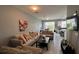 The open floor plan shows the living room flowing into the dining area and kitchen, providing a modern feel at 13885 Arclid St, Orlando, FL 32832