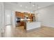 Spacious kitchen with granite countertops, stainless appliances and a large island, perfect for entertaining at 142 Olympus Way, Kissimmee, FL 34759