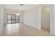 Spacious dining room with chandelier and tile flooring at 143 Brixham Ct, Kissimmee, FL 34758