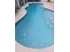 A refreshing blue pool with decorative blue tiles around its edge for a classic look at 143 Brixham Ct, Kissimmee, FL 34758
