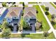 An aerial view of the neighborhood showcasing the well maintained homes at 14389 Lanikai Beach Dr, Orlando, FL 32827