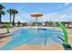 Interactive splash pad with colorful features and a safe, fun environment for children to enjoy at 14389 Lanikai Beach Dr, Orlando, FL 32827