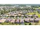 An aerial view showcases the neighborhood, highlighting the location of the home and nearby houses at 1470 Lake Side Ave, Davenport, FL 33837