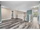 View of the upstairs hallway featuring wood floors and neutral walls at 1470 Lake Side Ave, Davenport, FL 33837
