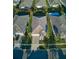 Bird's-eye view of home highlighting its roof, driveway, and well-maintained landscaping at 1508 Bunker Drive Bunker, Davenport, FL 33896