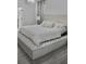 Elegant bedroom with a tufted headboard, luxurious bedding, and stylish decor at 1508 Bunker Drive Bunker, Davenport, FL 33896