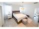 Bright bedroom with large windows, neutral decor and views of the home at 1508 Bunker Drive Bunker, Davenport, FL 33896