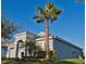 Beautifully landscaped home featuring a manicured lawn and elegant exterior design at 1508 Bunker Drive Bunker, Davenport, FL 33896