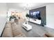 Open living room layout with hardwood flooring and media center at 1508 Bunker Drive Bunker, Davenport, FL 33896