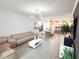 Spacious open-concept living space with dining room and kitchen view at 1508 Bunker Drive Bunker, Davenport, FL 33896