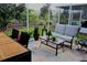 This patio features a comfortable seating area and a table for outdoor dining at 1508 Bunker Drive Bunker, Davenport, FL 33896