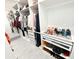 Spacious walk-in closet with custom shelving, hanging rods, drawers, and ample storage for clothes, shoes, and accessories at 1508 Bunker Drive Bunker, Davenport, FL 33896
