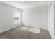 Simple bedroom with neutral carpet, natural light and an closet at 1524 Fleur Dr, Davenport, FL 33837