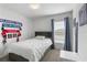 Bright bedroom features a comfortable bed, natural light, and tasteful decorations at 1524 Fleur Dr, Davenport, FL 33837