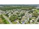 Scenic aerial view of the neighborhood with tree-lined streets and various home styles at 1626 Gar St, St Cloud, FL 34771