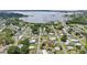 Aerial view of the community with homes and a lake nearby at 1626 Gar St, St Cloud, FL 34771