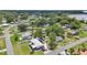 Features a residential area with a mix of single-Gathering homes, mature trees, and well-kept lawns at 1626 Gar St, St Cloud, FL 34771