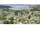 Aerial view of the community with homes and a lake nearby at 1626 Gar St, St Cloud, FL 34771