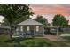 Charming bungalow with a covered porch, carport, and quaint curb appeal at 1626 Gar St, St Cloud, FL 34771