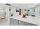 Well lit modern kitchen featuring white countertops and a breakfast nook at 1626 Gar St, St Cloud, FL 34771