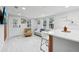 Bright living room with white accents, modern furniture, and plenty of natural light at 1626 Gar St, St Cloud, FL 34771