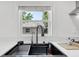 The Kitchen sink has modern fixtures and ample counter space for easy food preparation at 1626 Gar St, St Cloud, FL 34771
