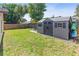 Well-maintained backyard featuring a storage shed and lawn at 1712 Melvin Ave, Orlando, FL 32806
