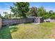 Backyard featuring a storage shed and fenced yard at 1712 Melvin Ave, Orlando, FL 32806