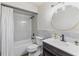 This bathroom features white subway tile in the shower and decorative bronze fixtures and hardware at 1712 Melvin Ave, Orlando, FL 32806