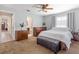 Serene main bedroom with neutral tones, and a connecting bathroom at 1712 Melvin Ave, Orlando, FL 32806