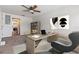 Bright office features a ceiling fan and a large desk area, perfect for working from home at 1712 Melvin Ave, Orlando, FL 32806