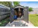 Open backyard shed with double doors at 1712 Melvin Ave, Orlando, FL 32806