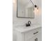 Bathroom vanity featuring sleek black fixtures and white marble countertops at 1842 Puritan Ave, Winter Park, FL 32792