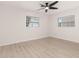 Bedroom features sleek ceiling fan, wood floors and dual windows for natural light at 1842 Puritan Ave, Winter Park, FL 32792