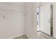 Walk-in pantry features wire shelving for optimal kitchen storage and light colored wood-look flooring at 1842 Puritan Ave, Winter Park, FL 32792