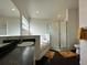 Bright bathroom with a shower stall, sunken jacuzzi bathtub, and dual vanity sinks at 2410 Sweetwater Blvd, St Cloud, FL 34772